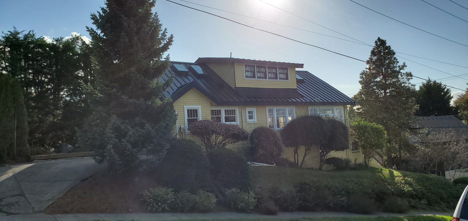 Standing seam metal roof installed by B&J Roofing