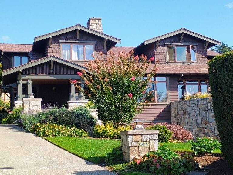 Craftsman-style house with a composition roof by B&J Roofing